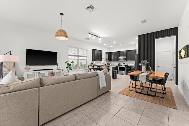 living room featuring light tile patterned floors