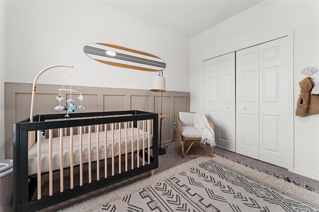 bedroom with a closet and a notable chandelier