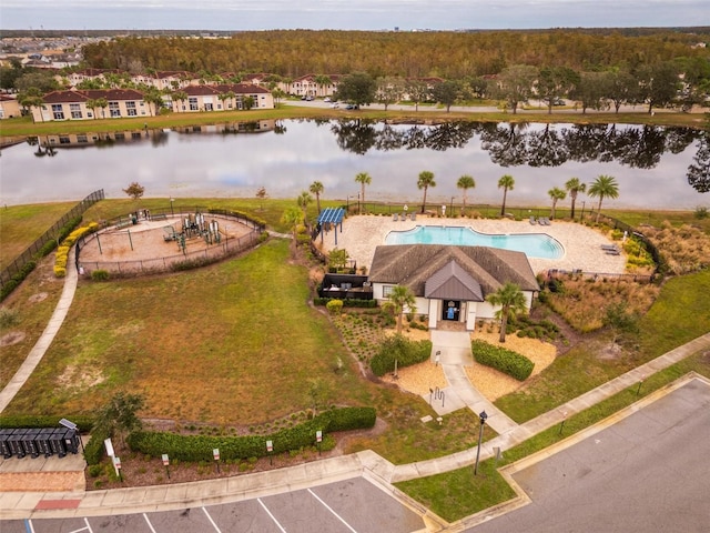 birds eye view of property featuring a water view