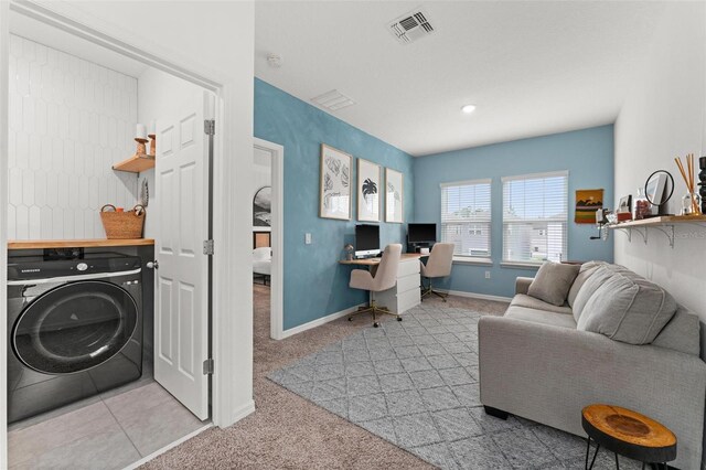 interior space with washer / clothes dryer