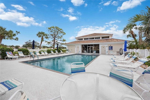 view of swimming pool with a patio area