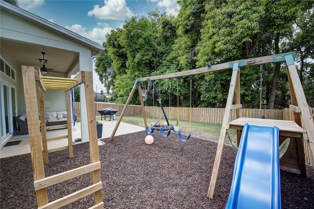 view of play area with a patio area and ceiling fan