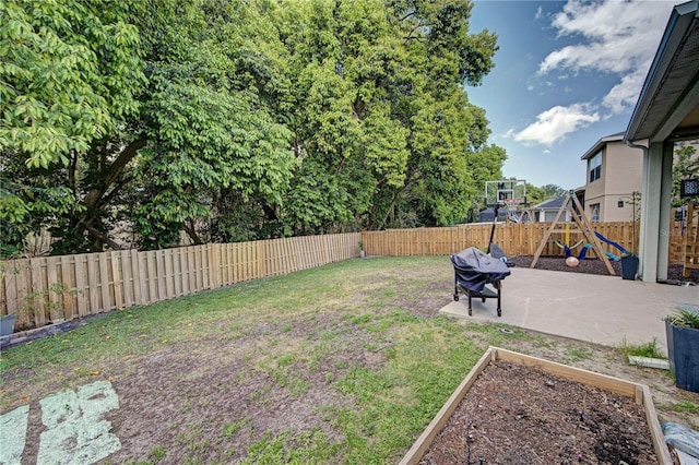 view of yard with a playground