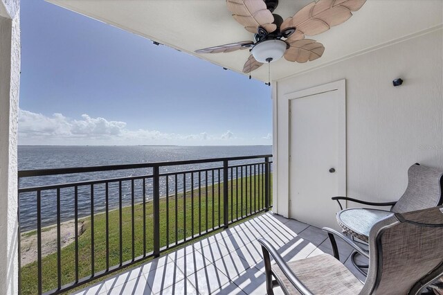 balcony featuring a water view