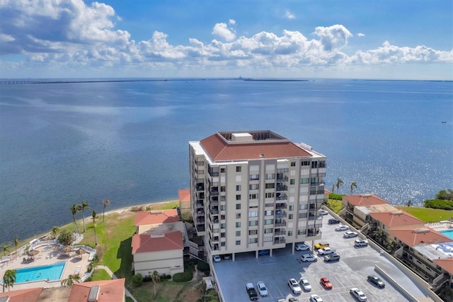 birds eye view of property featuring a water view