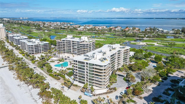 drone / aerial view with a water view