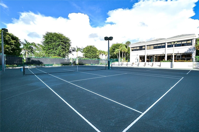 view of sport court featuring basketball hoop