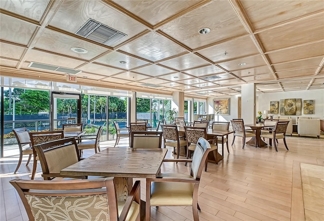 sunroom featuring plenty of natural light and coffered ceiling