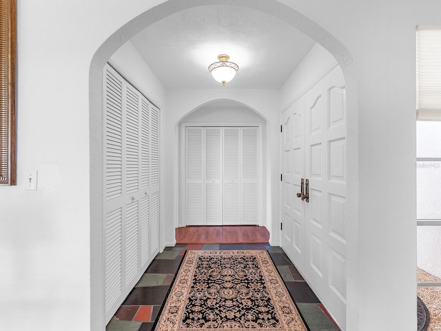 doorway to outside featuring plenty of natural light