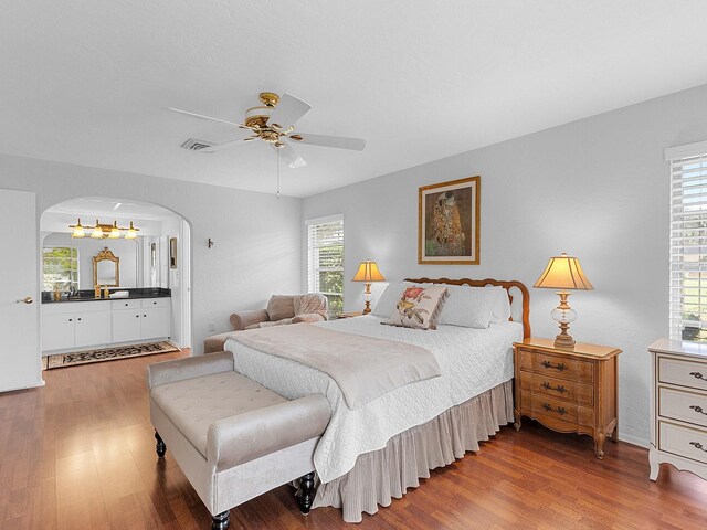 bedroom featuring ceiling fan and hardwood / wood-style flooring