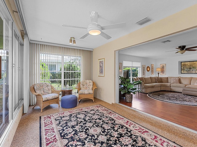 living room with ceiling fan