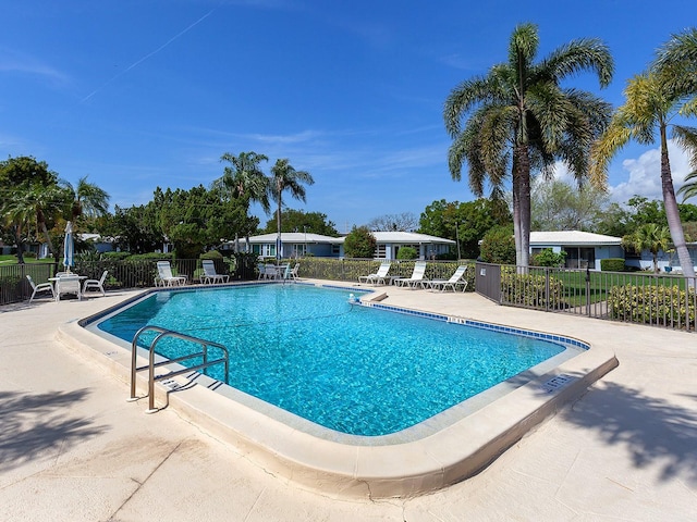 view of swimming pool with a patio