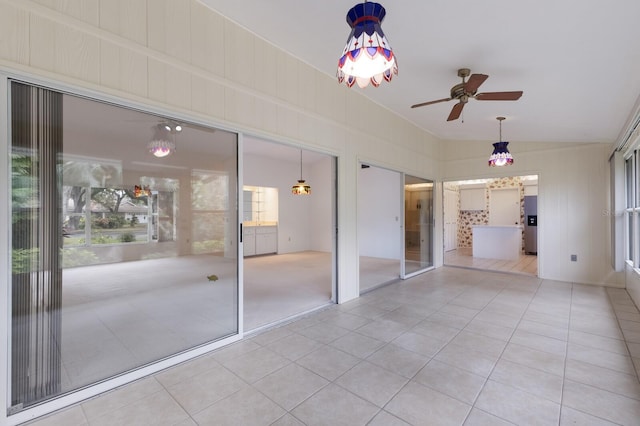 interior space featuring ceiling fan