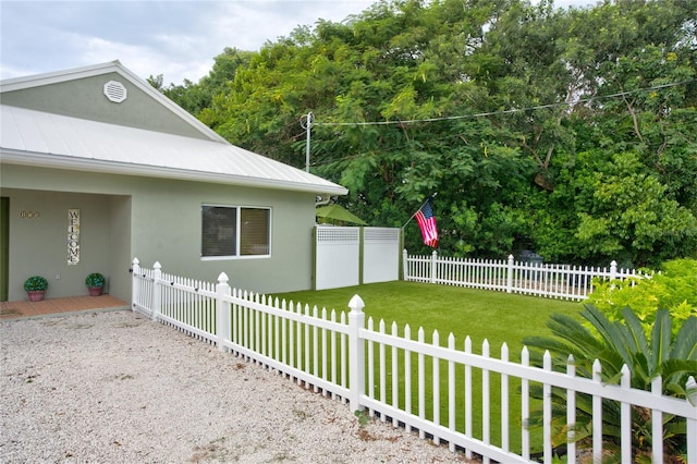 view of property exterior featuring a yard