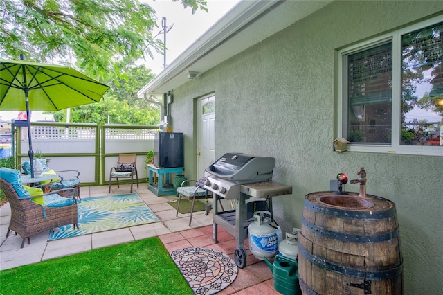 view of patio with a grill