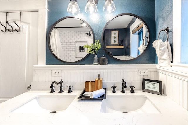 bathroom with vanity and walk in shower