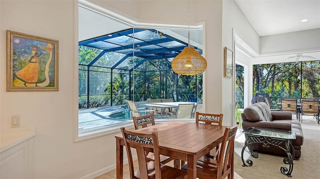 sunroom featuring a pool and ceiling fan