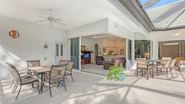 view of patio / terrace featuring ceiling fan