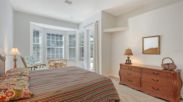 9506 Royal Calcutta Pl, Lakewood Ranch, FL 34202 - bedroom with light carpet and baseboards