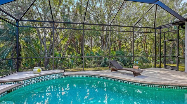 9506 Royal Calcutta Pl, Lakewood Ranch, FL 34202 - outdoor pool featuring a patio area and a lanai