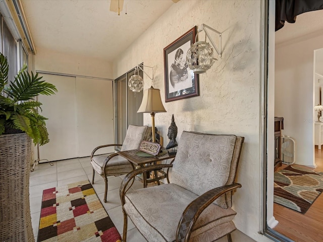 living area featuring light tile patterned floors