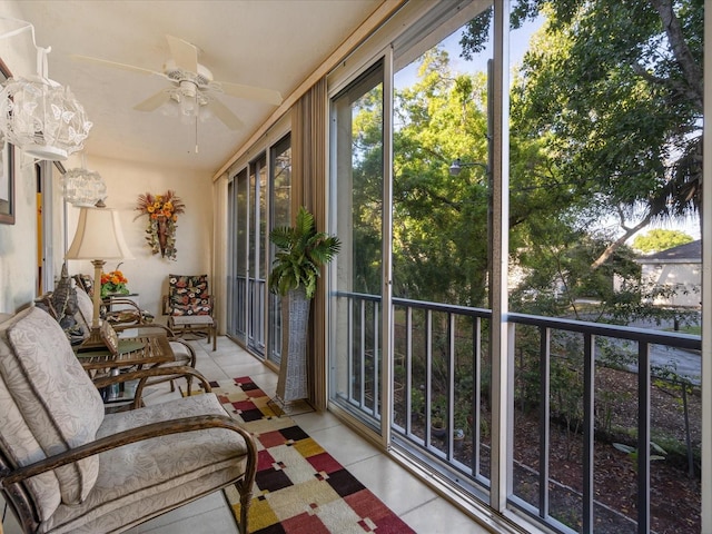 sunroom / solarium with ceiling fan