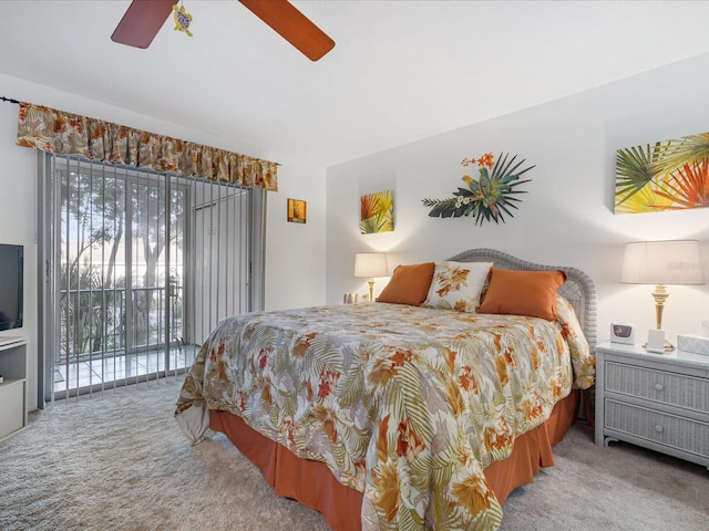 carpeted bedroom featuring ceiling fan and access to outside