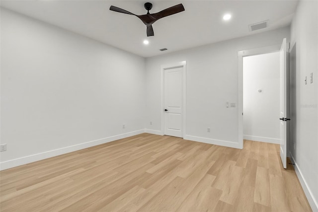 unfurnished bedroom with ceiling fan and light wood-type flooring