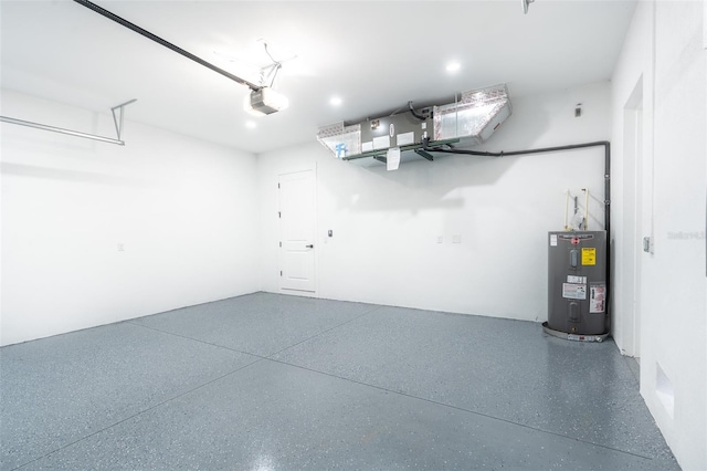 garage featuring water heater and a garage door opener