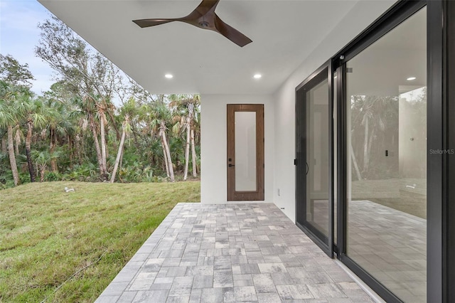 view of patio with ceiling fan