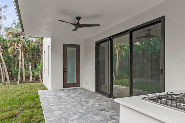 view of patio / terrace featuring ceiling fan