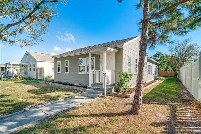 view of front of home with a front yard