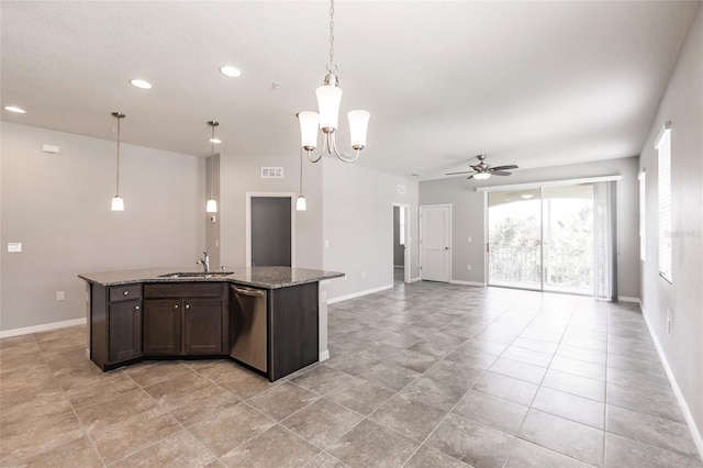 kitchen featuring dishwasher, a center island with sink, sink, dark stone countertops, and dark brown cabinets