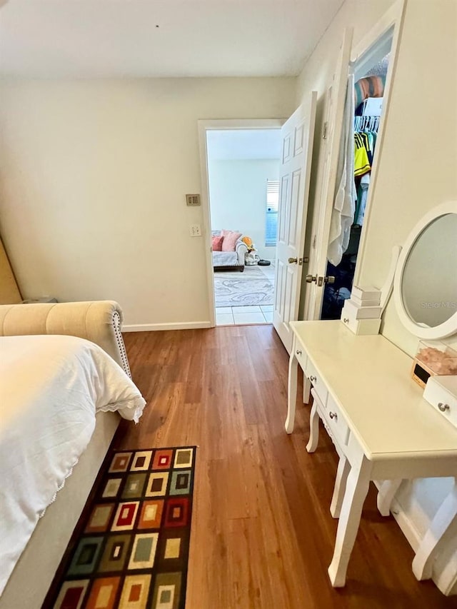 bedroom featuring hardwood / wood-style floors