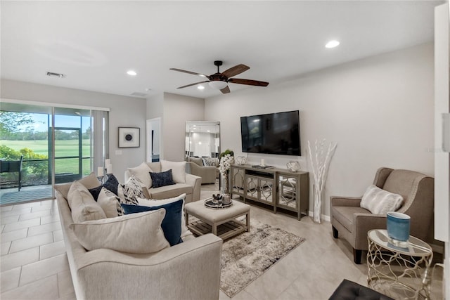 living room featuring ceiling fan