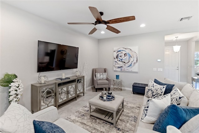 living room with ceiling fan