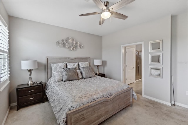 bedroom featuring ceiling fan and light carpet