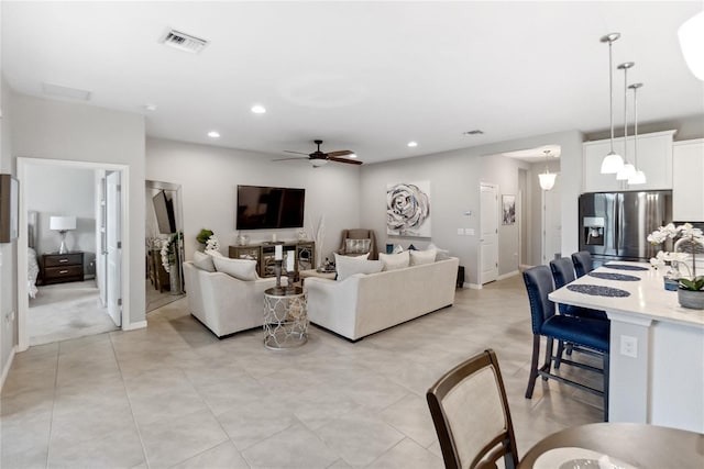 living room featuring ceiling fan