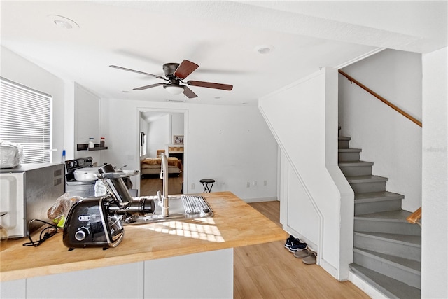 1501 14th Ave W, Bradenton, FL 34205 - exercise room with wood finished floors, ceiling fan, and recessed lighting