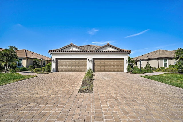 view of front of home with a garage