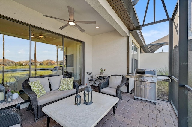 sunroom / solarium with ceiling fan