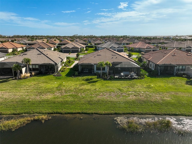 drone / aerial view featuring a water view