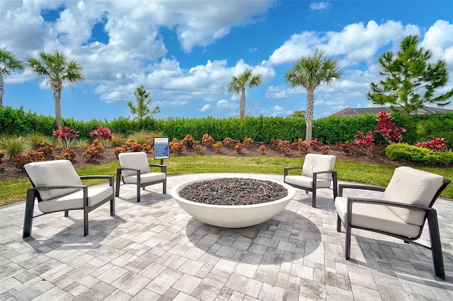 view of patio / terrace with an outdoor fire pit