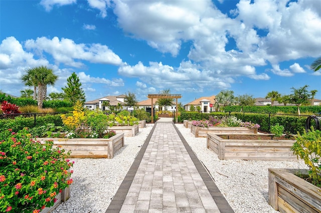 surrounding community featuring a pergola