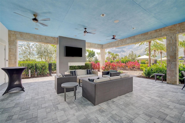 view of patio / terrace featuring an outdoor living space and ceiling fan