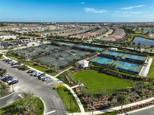 birds eye view of property featuring a water view