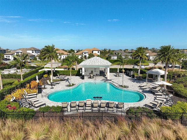 view of swimming pool featuring a patio area