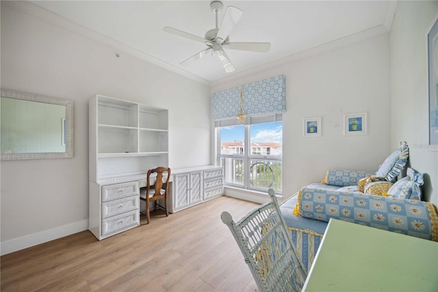 interior space featuring light hardwood / wood-style flooring, ceiling fan, and crown molding