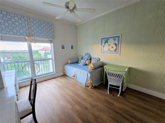 5450 Eagles Point Cir Unit 405, Sarasota, FL 34231 - bedroom featuring ornamental molding, wood finished floors, baseboards, and ceiling fan