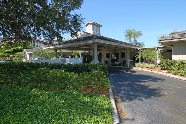 5450 Eagles Point Cir Unit 405, Sarasota, FL 34231 - view of front of property with driveway and a carport